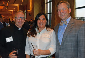 Pictured (LtoR) Fr. John Savard, S.J. Loyola University Maryland rector; Laura Day, former Notre Dame Preparatory School counselor; and Anthony Day, Loyola Blakefield president
