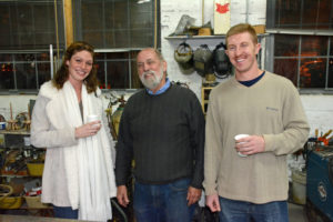 Pictured (LtoR) Hannah Triebel, Sunnyfield's interior designer; Paul Daniel, sculptor; and Dan Schonfeld, US Air Force 1st lieutenant, inside Daniel's studio